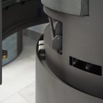 H&M Germany EVO 2.1 XL Kaminofen – 7 kW – Moderner Rundkamin mit Naturstein-Verkleidung – Titanium-Design – Integriertes Holzfach – Energieeffizienzklasse A - Image 5