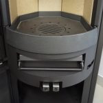 H&M Germany EVO 2.1 XL Kaminofen – 7 kW – Moderner Rundkamin mit Naturstein-Verkleidung – Titanium-Design – Integriertes Holzfach – Energieeffizienzklasse A - Image 3